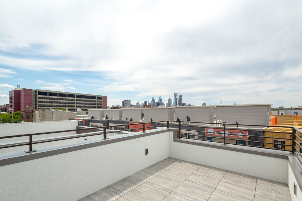 Photo of a mid-sized contemporary rooftop deck in Philadelphia with no cover.