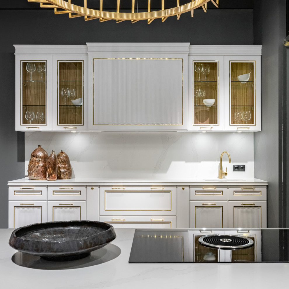 Inspiration for a large transitional galley separate kitchen in Moscow with recessed-panel cabinets, white cabinets and with island.
