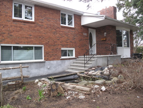 Help How Do I Improve The Curb Eal Of Our Split Level House Any Ideas For Bringing A Wow Factor To This Front Area Garden Porch Walkway Or The House Decor Photos Examples Would Be Reciated