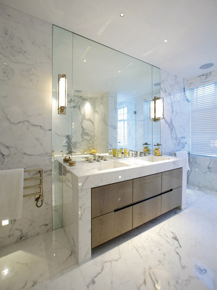 Design ideas for a large traditional family bathroom in London with flat-panel cabinets, brown cabinets, an alcove bath, an alcove shower, white tiles, marble tiles, white walls, marble flooring, a built-in sink, marble worktops, white floors, an open shower, white worktops, feature lighting, double sinks and a built in vanity unit.