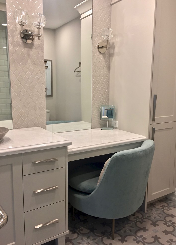 Small transitional master wet room bathroom in Toronto with furniture-like cabinets, beige cabinets, a one-piece toilet, beige tile, ceramic tile, beige walls, cement tiles, a vessel sink, wood benchtops, multi-coloured floor, a hinged shower door and white benchtops.