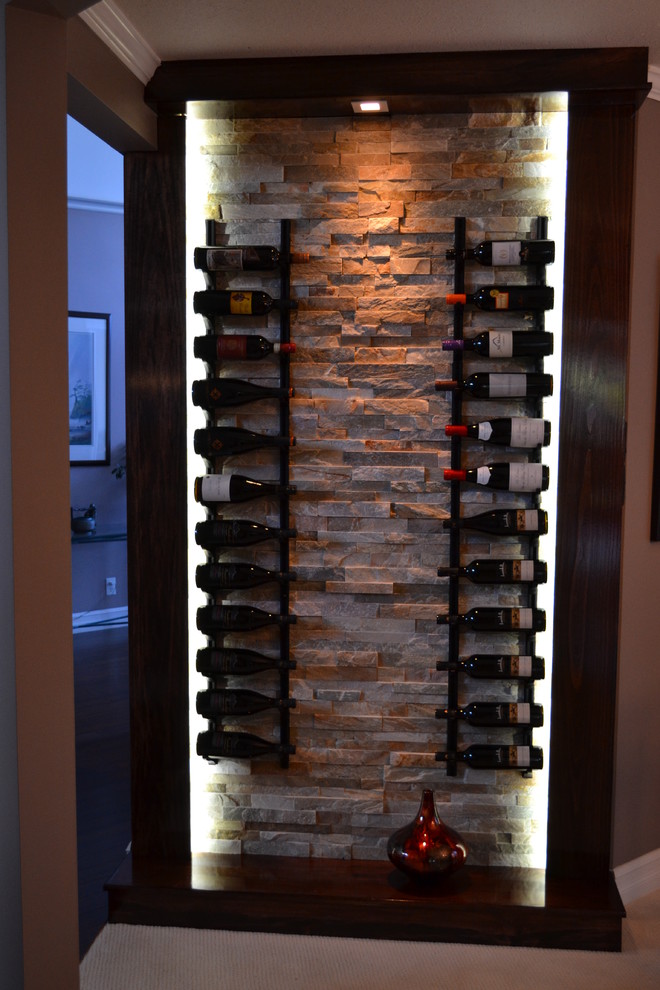 Inspiration for a contemporary wine cellar remodel in Vancouver