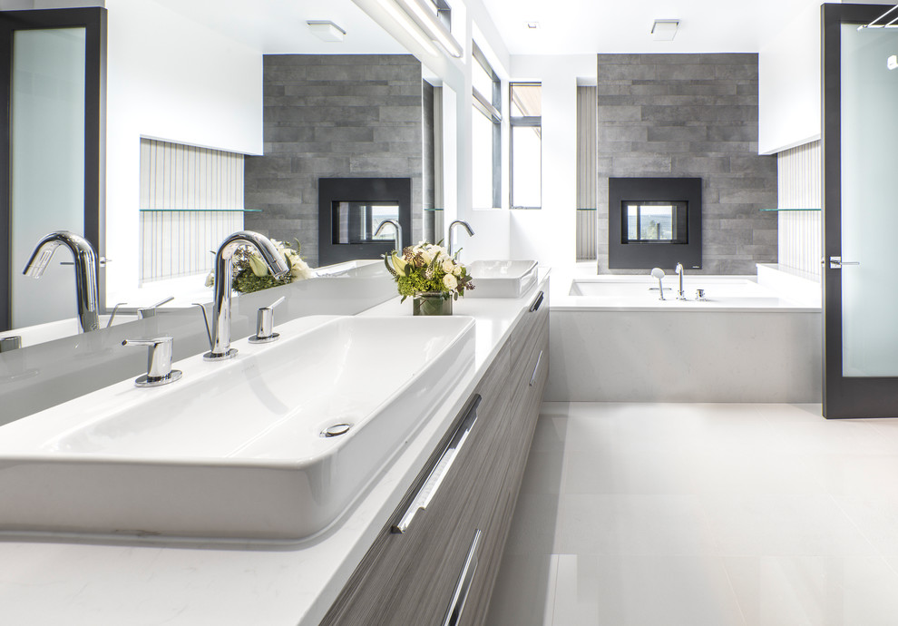 Large contemporary master bathroom in Seattle with flat-panel cabinets, grey cabinets, an undermount tub, white walls, a vessel sink, white floor, an alcove shower, brown tile, ceramic tile, porcelain floors, solid surface benchtops, a hinged shower door and white benchtops.