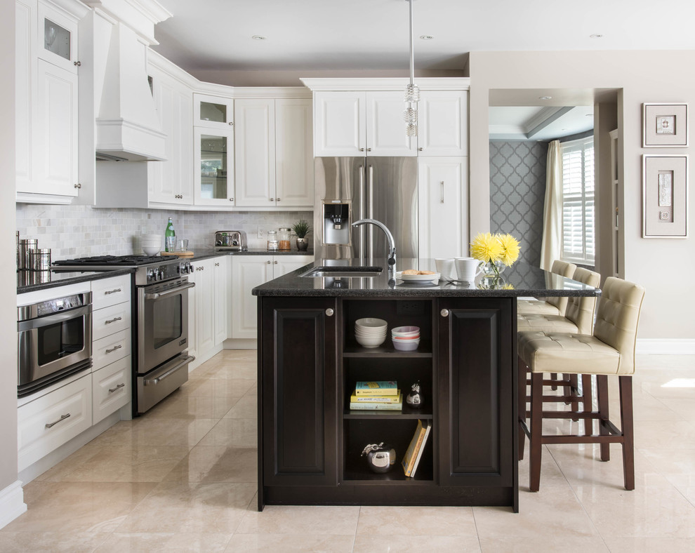 Example of a transitional kitchen design in Toronto