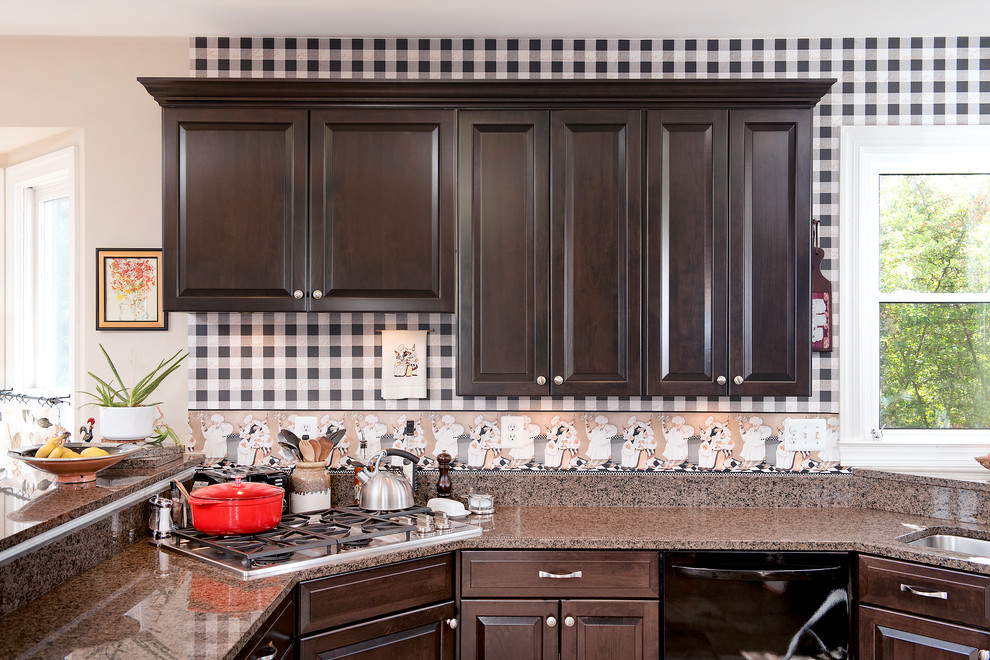 Traditional u-shaped kitchen in Baltimore with a double-bowl sink, raised-panel cabinets, brown cabinets, granite benchtops, black appliances, beige floor and beige benchtop.