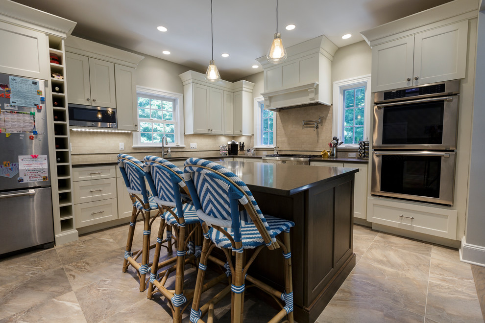 Open concept kitchen - mid-sized rustic l-shaped porcelain tile and beige floor open concept kitchen idea in Bridgeport with an undermount sink, shaker cabinets, white cabinets, granite countertops, beige backsplash, porcelain backsplash, stainless steel appliances and an island