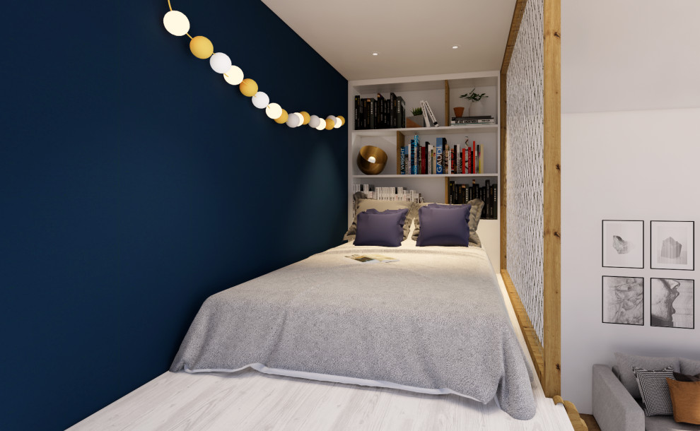 Idéer för att renovera ett mellanstort funkis könsneutralt tonårsrum kombinerat med sovrum, med blå väggar och ljust trägolv