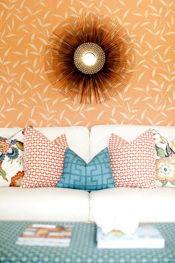 Inspiration for a mid-sized eclectic living room in Portland with orange walls.