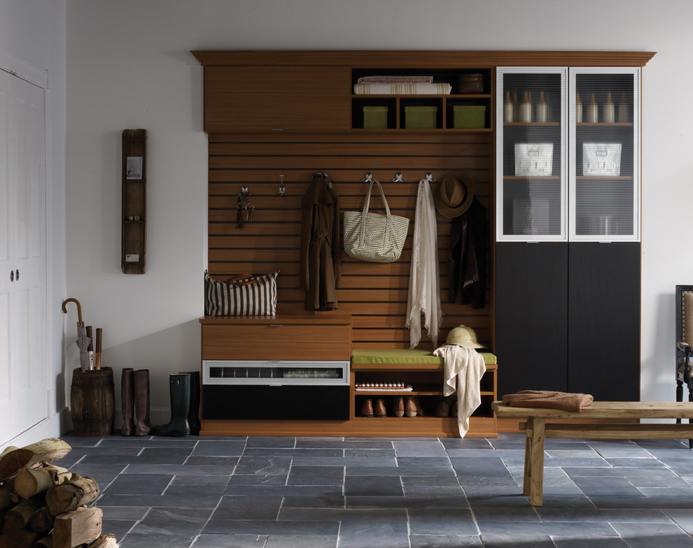 Example of a mid-sized transitional slate floor entryway design in Santa Barbara with white walls and a white front door