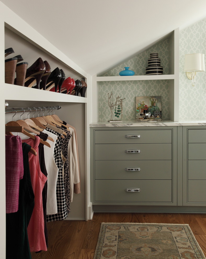 Design ideas for a transitional women's dressing room in Atlanta with flat-panel cabinets, grey cabinets and medium hardwood floors.