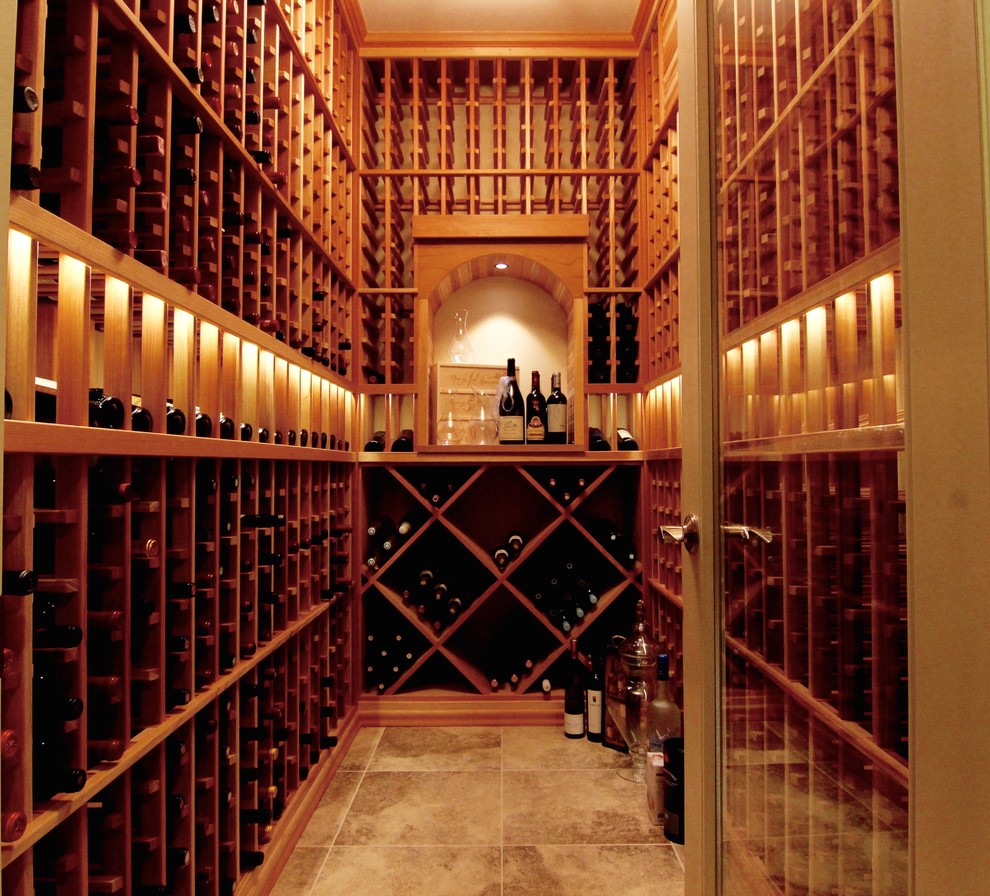 Photo of a transitional wine cellar in Seattle.