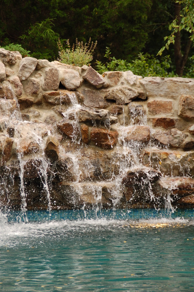 Pool fountain - mid-sized transitional backyard brick and custom-shaped natural pool fountain idea in Baltimore