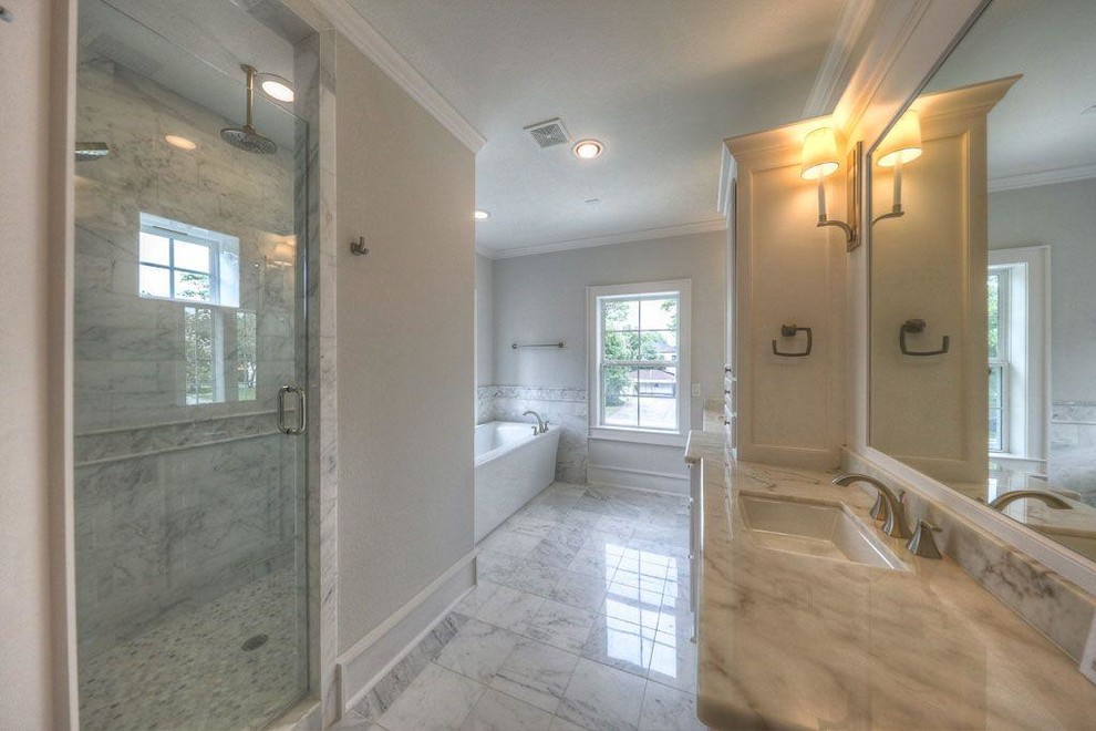 Mid-sized transitional master white tile and stone tile marble floor home design photo in Houston with shaker cabinets, white cabinets, a two-piece toilet, gray walls, a drop-in sink and quartzite countertops