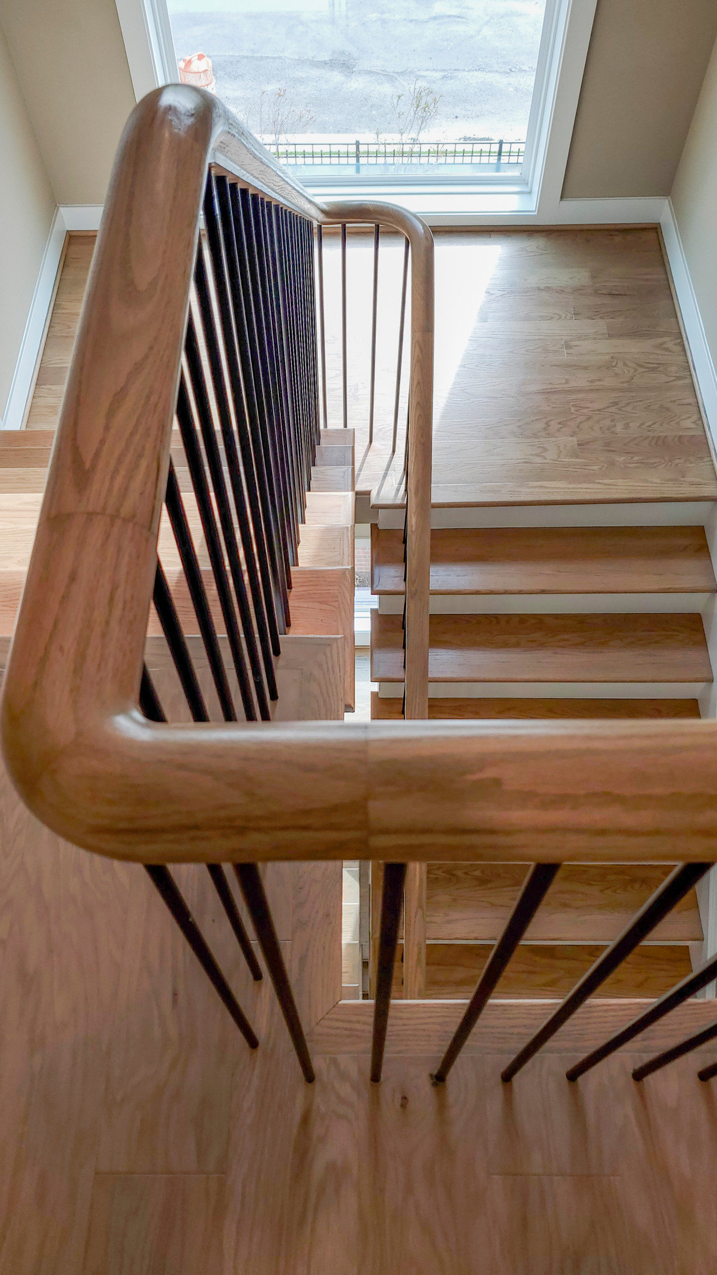 Project #153 | Sophisticated Red Oak Stair with Metal Balusters