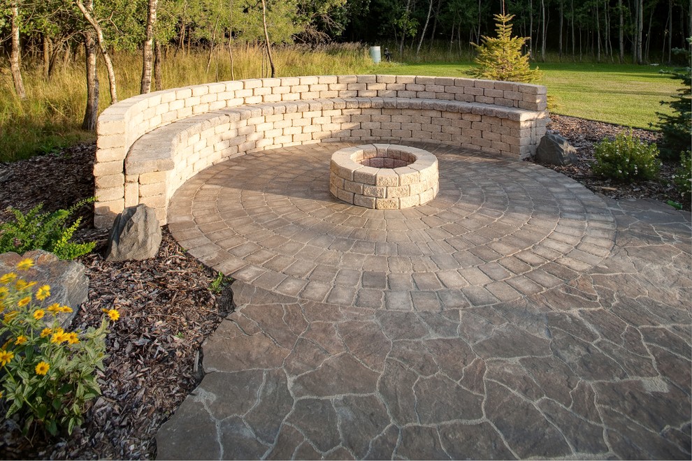 Inspiration for a large traditional backyard patio in Other with an outdoor kitchen, concrete pavers and no cover.