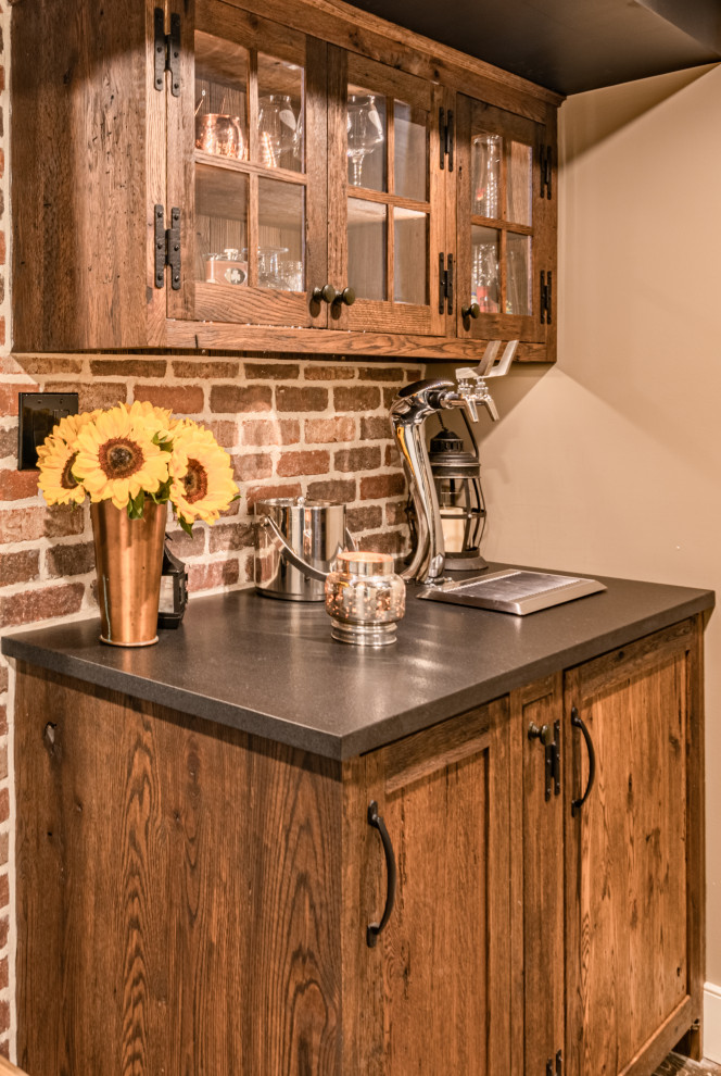 Inspiration for a small country u-shaped wet bar in Philadelphia with shaker cabinets, medium wood cabinets, concrete benchtops, brown splashback, brick splashback, porcelain floors and grey benchtop.