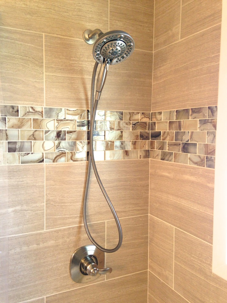 Inspiration for a mid-sized transitional kids' beige tile and porcelain tile porcelain tile home design remodel with an integrated sink, raised-panel cabinets, medium tone wood cabinets, quartz countertops, a two-piece toilet and yellow walls