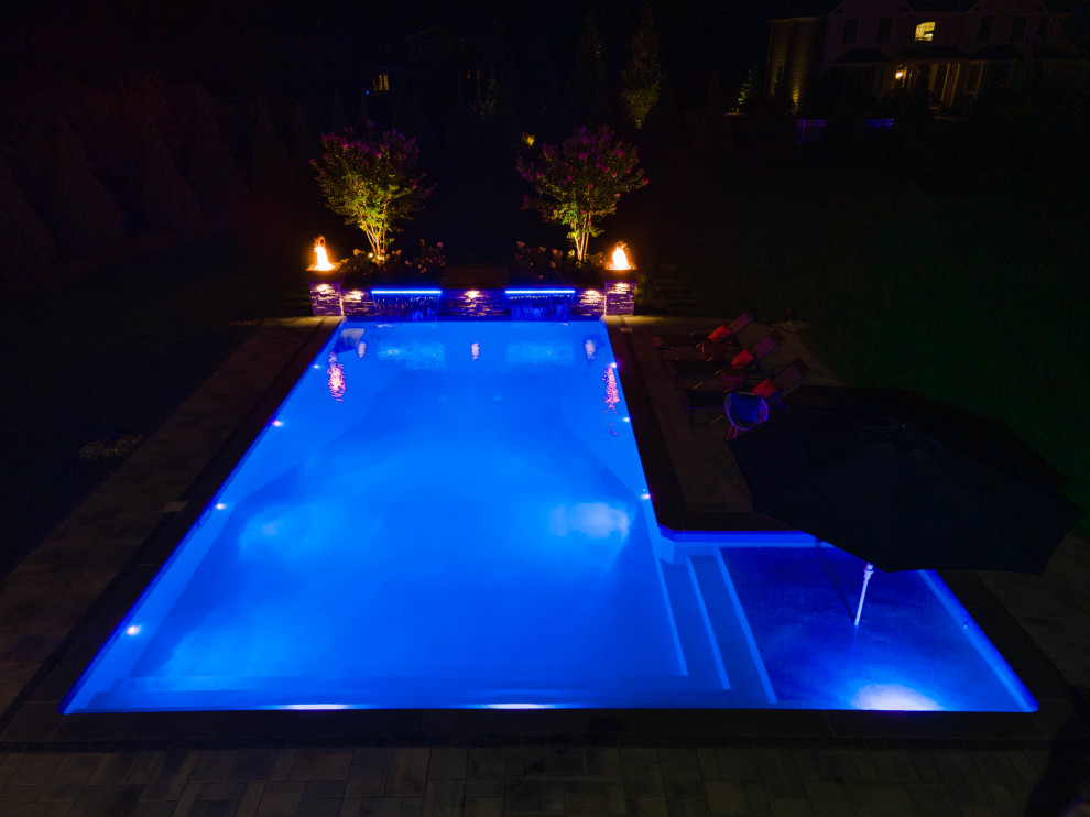 Inspiration for a large contemporary pool remodel in New York