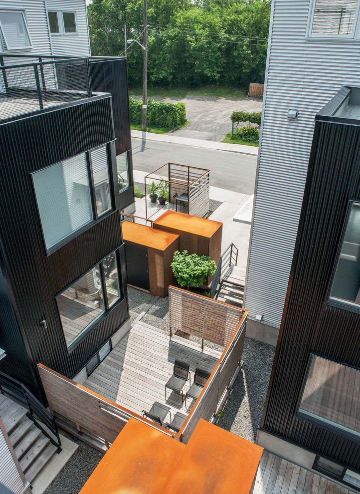 This is an example of a contemporary deck in Ottawa.