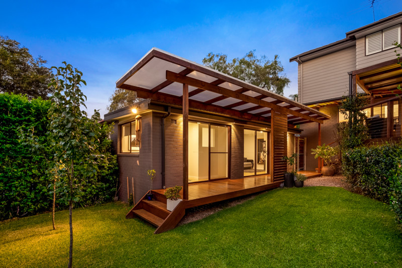 Photo of a mid-sized contemporary detached granny flat in Sydney.