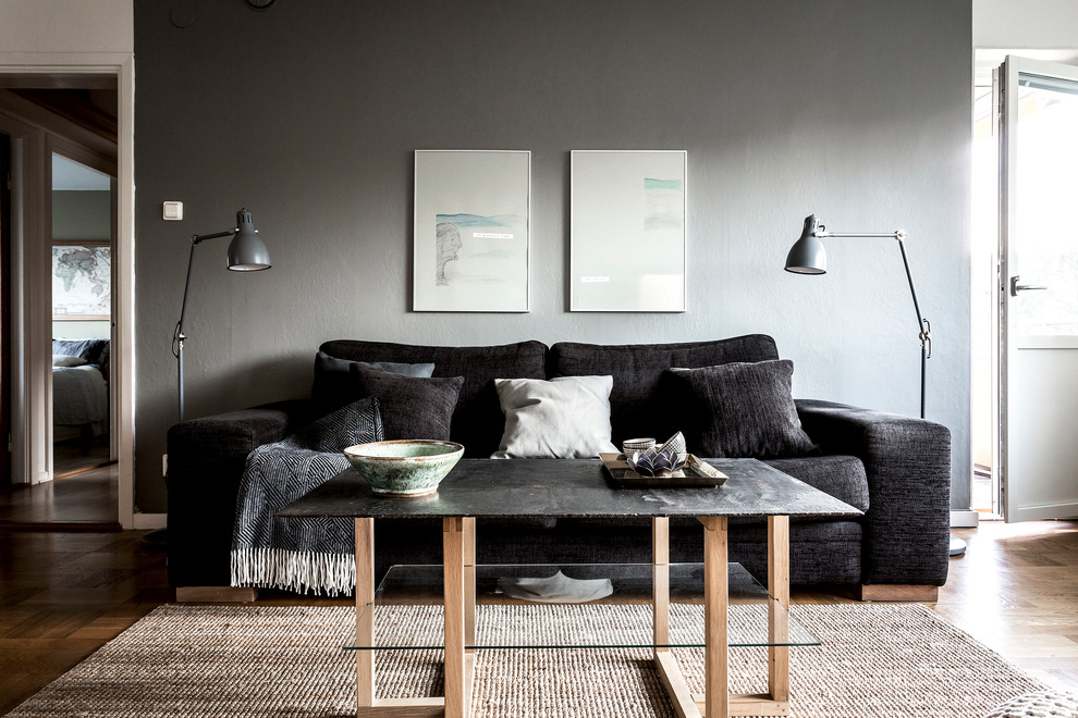 Design ideas for a mid-sized scandinavian formal living room in Stockholm with grey walls, dark hardwood floors, no fireplace and no tv.