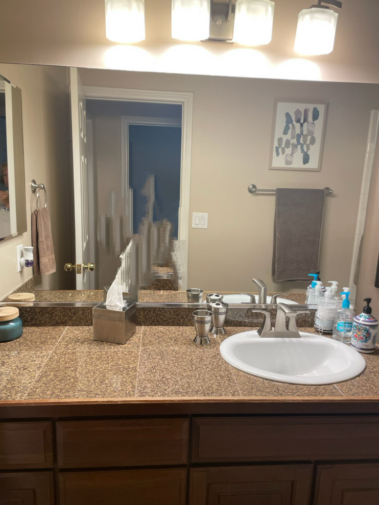 bathroom mirror over vanity dilemma