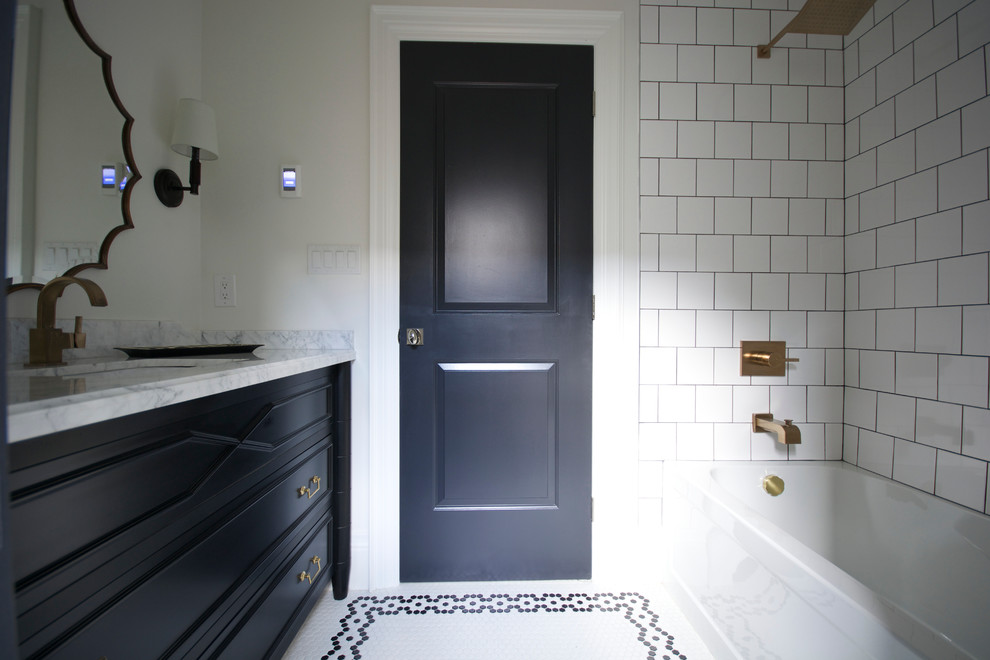 Photo of a small traditional family bathroom in Toronto with a submerged sink, freestanding cabinets, black cabinets, marble worktops, an alcove bath, a shower/bath combination, a one-piece toilet, white tiles, ceramic tiles, white walls and mosaic tile flooring.