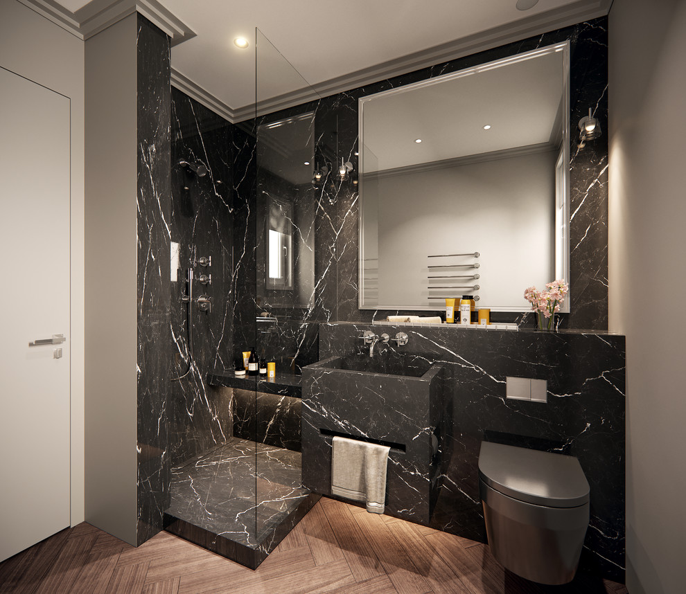 Design ideas for a mid-sized contemporary 3/4 bathroom in Paris with a wall-mount toilet, black tile, marble, an integrated sink, marble benchtops, brown floor, an open shower, black benchtops, black cabinets, a corner shower, grey walls and ceramic floors.