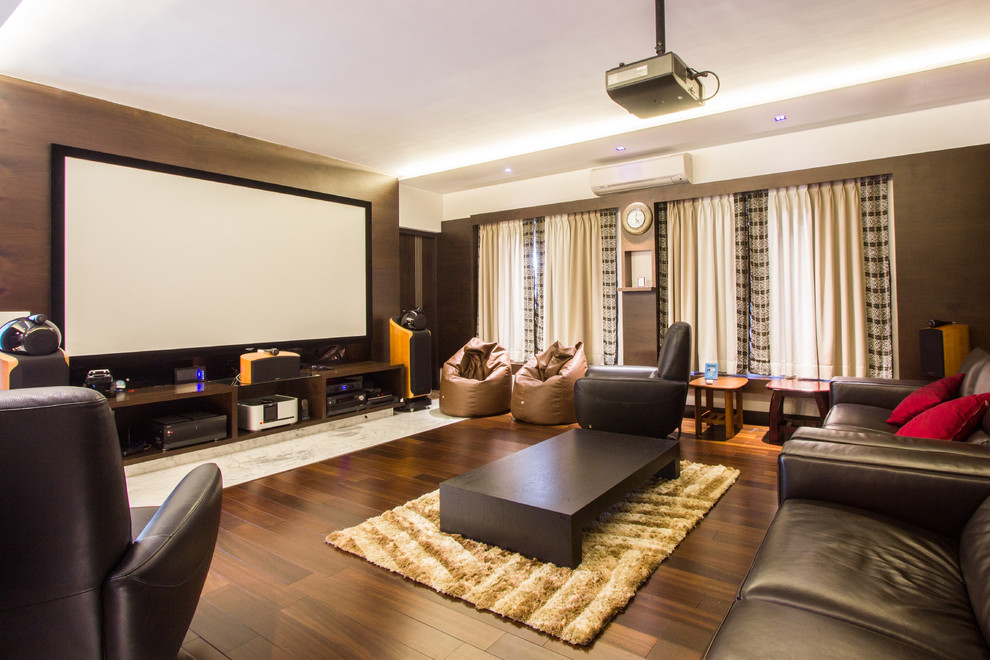Inspiration for a modern home theatre in Bengaluru.