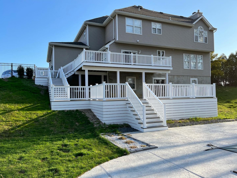Deck - large coastal backyard deck idea