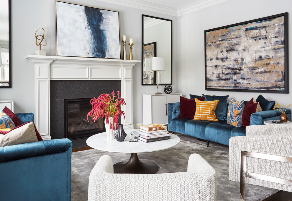 Inspiration for a large transitional formal and open concept brown floor and dark wood floor living room remodel in Chicago with gray walls, a standard fireplace, a stone fireplace and no tv