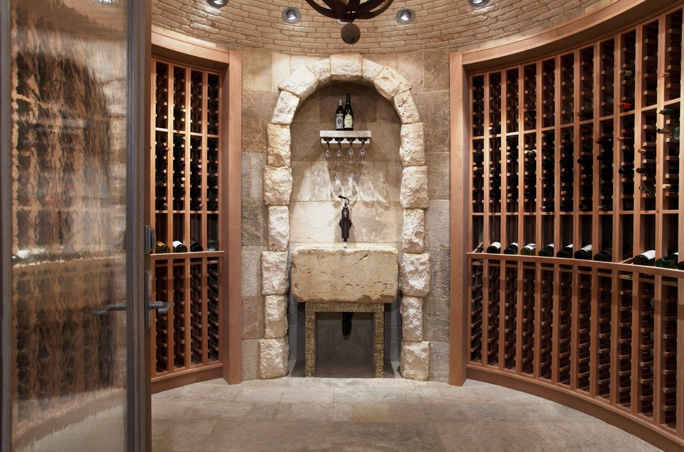 Mediterranean wine cellar in Orange County with storage racks.
