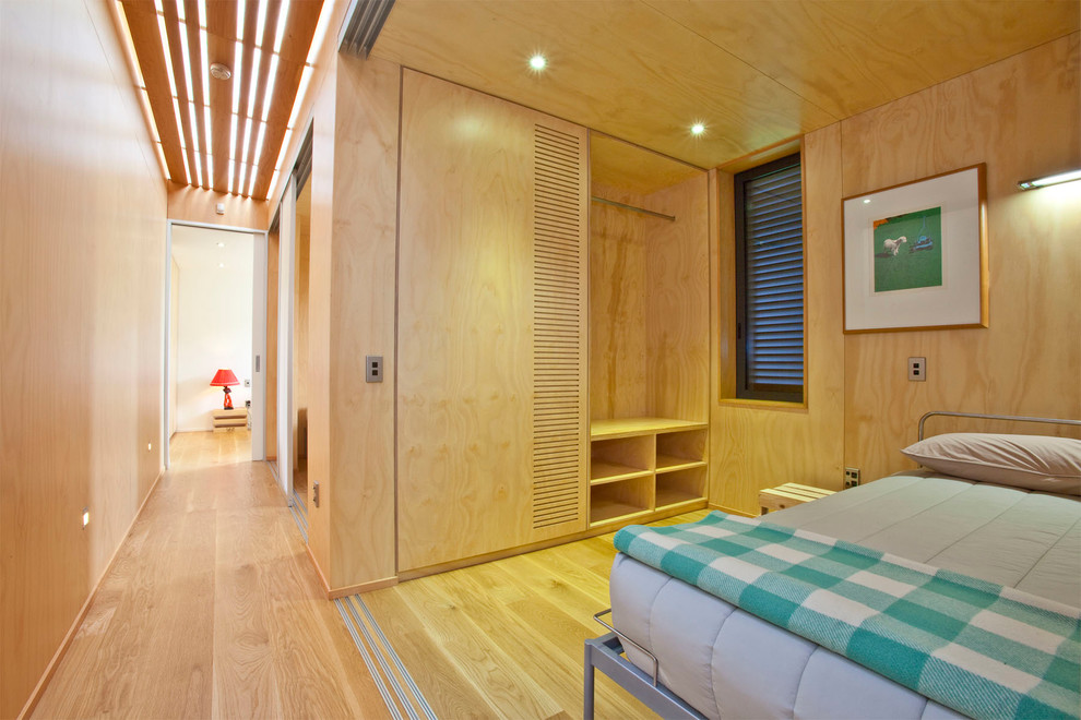Design ideas for a beach style bedroom in Hamilton.