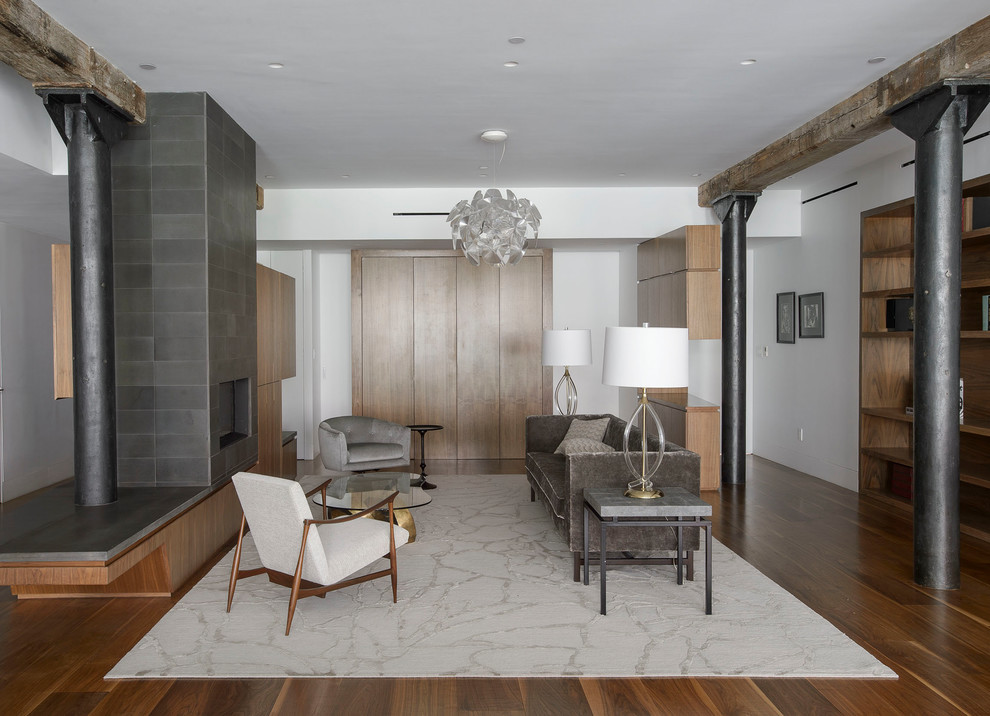 Living room - industrial open concept medium tone wood floor living room idea in New York with white walls, a ribbon fireplace and a tile fireplace