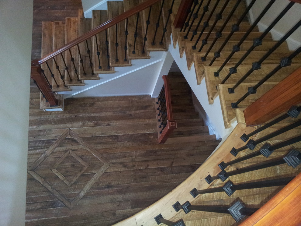 Inspiration for a large traditional wood l-shaped staircase in Toronto with wood risers and mixed railing.