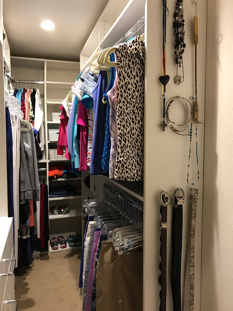 This is an example of a transitional storage and wardrobe in Miami.