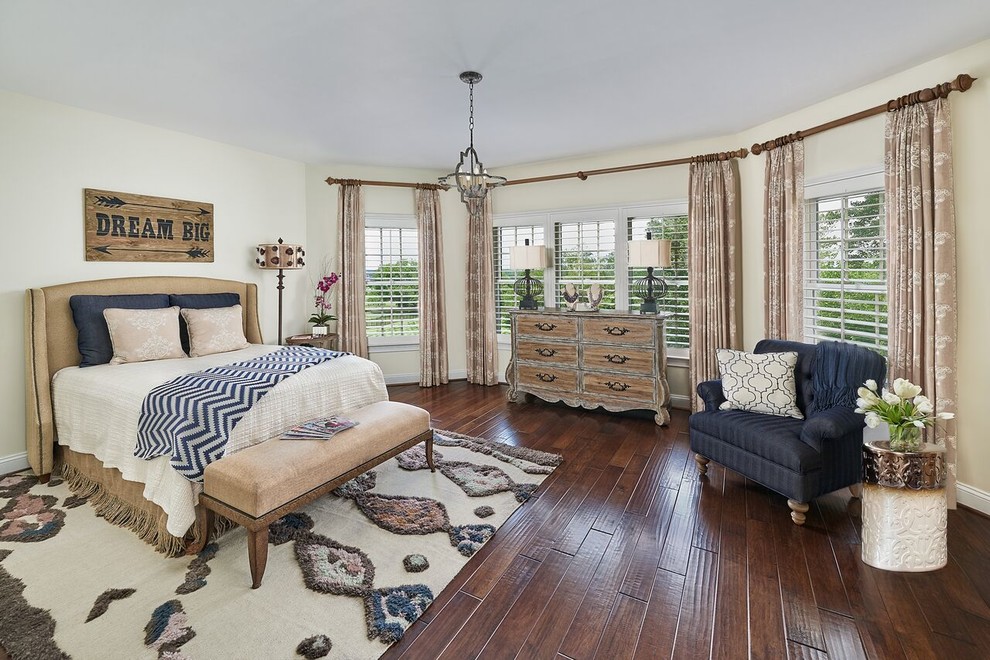 Design ideas for a mid-sized transitional guest bedroom in DC Metro with beige walls, dark hardwood floors and no fireplace.
