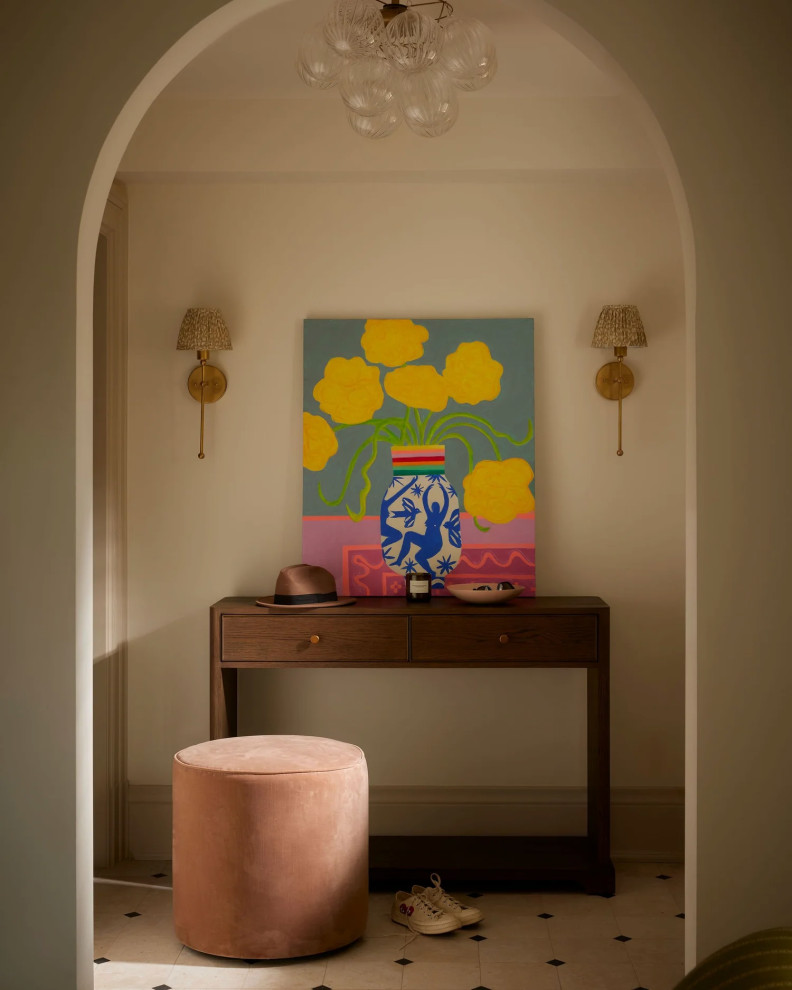 Inspiration for a mid-sized transitional marble floor and beige floor foyer remodel in New York with beige walls