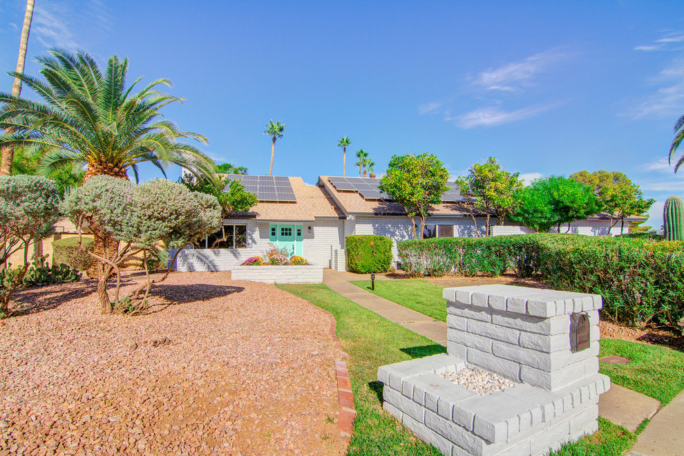 Inspiration for a transitional exterior home remodel in Phoenix