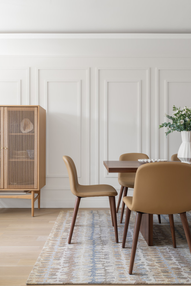 Kitchen/dining room combo - mid-sized contemporary light wood floor, brown floor and wall paneling kitchen/dining room combo idea in DC Metro with yellow walls