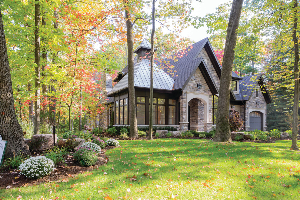 Design ideas for a traditional exterior in Toronto with stone veneer.