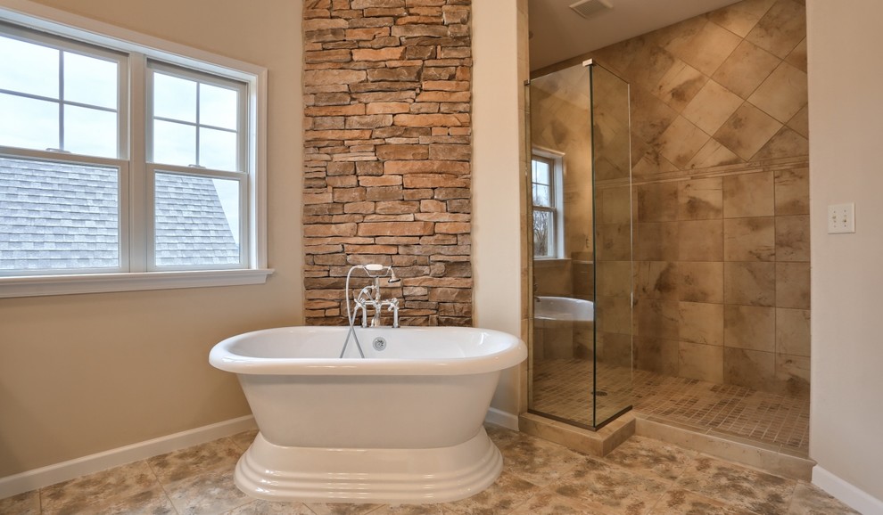 Inspiration for a large arts and crafts master bathroom in Other with a freestanding tub, an alcove shower, a one-piece toilet, beige walls, ceramic floors and an open shower.