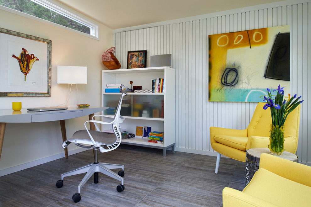 This is an example of a midcentury home office in Denver.