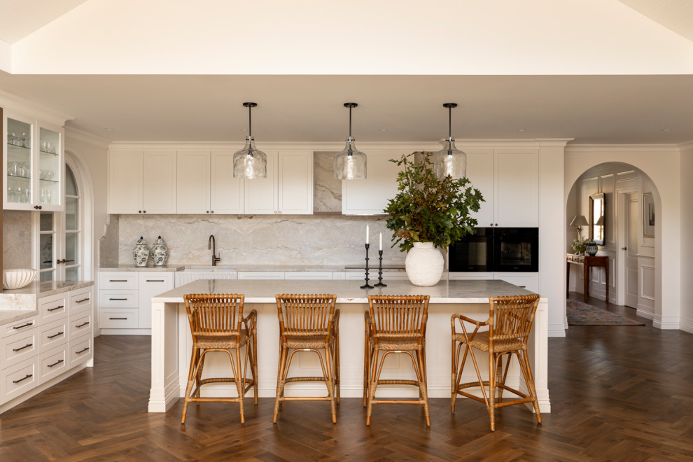 Design ideas for a traditional kitchen in Brisbane with shaker cabinets, white cabinets and with island.