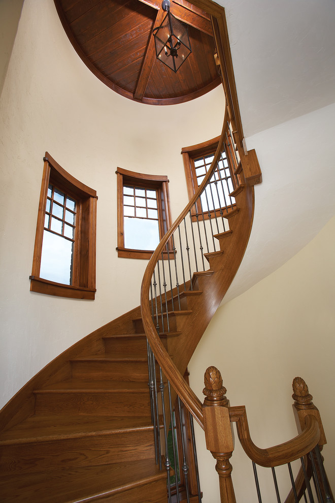 Traditional wood spiral staircase in Other.