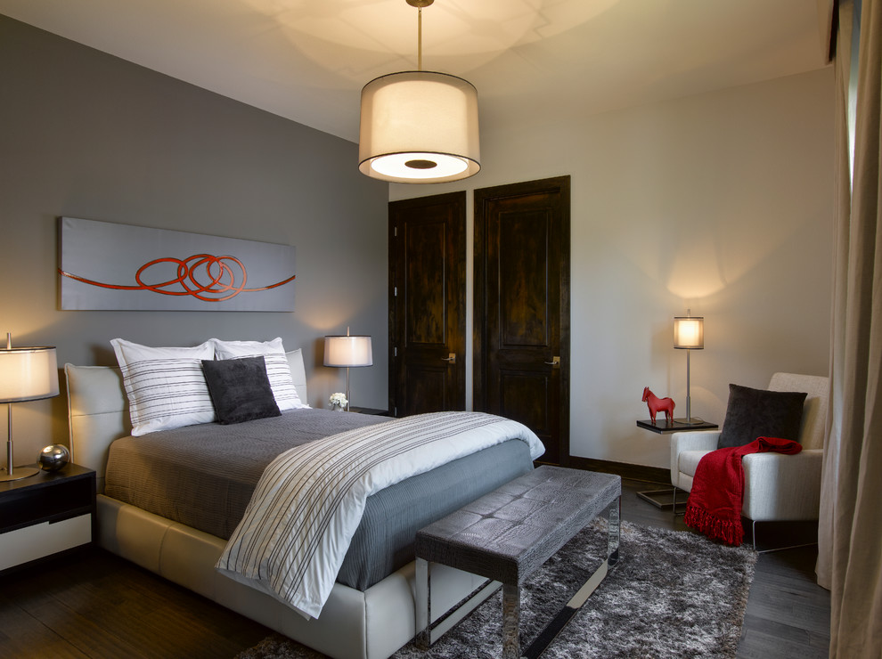 Design ideas for a transitional bedroom in Houston with grey walls.