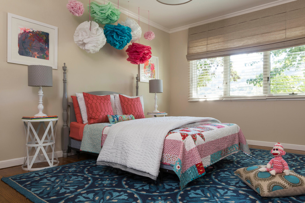 Inspiration for an eclectic kids' bedroom for girls in San Francisco with beige walls and dark hardwood floors.