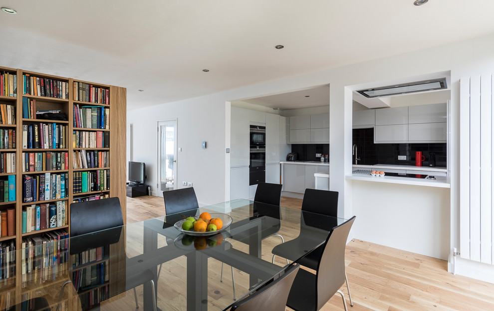 This is an example of a contemporary dining room in London.