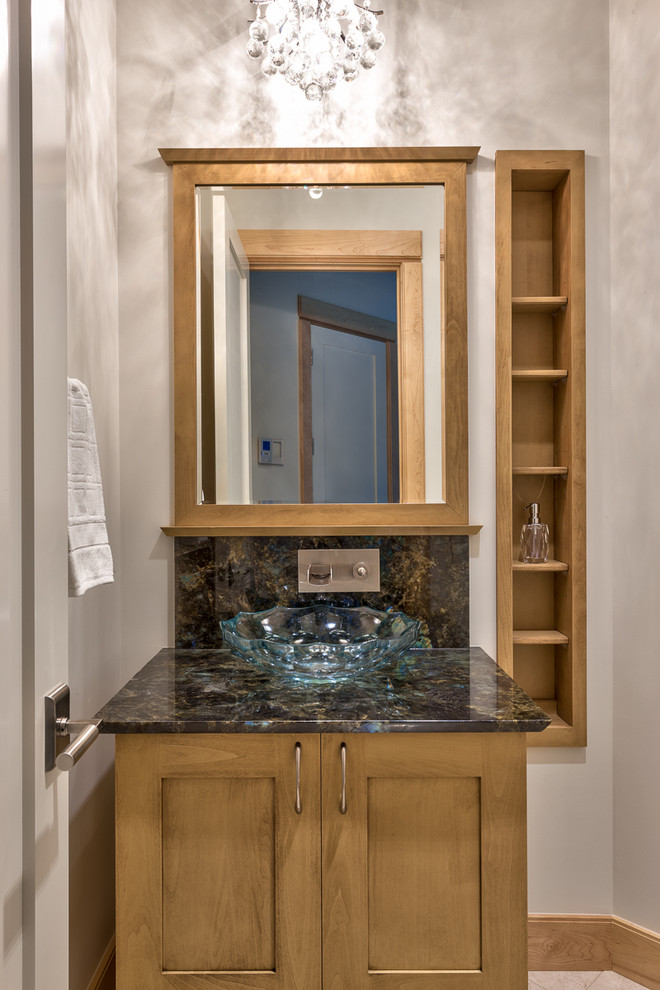 Contemporary powder room in Other with a vessel sink.