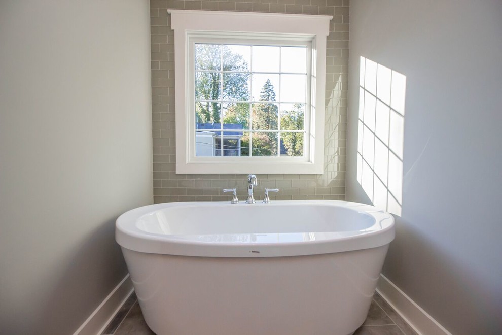 Inspiration for a large traditional master bathroom in Other with shaker cabinets, dark wood cabinets, a drop-in tub, an alcove shower, white tile, subway tile, grey walls, ceramic floors, a vessel sink and wood benchtops.